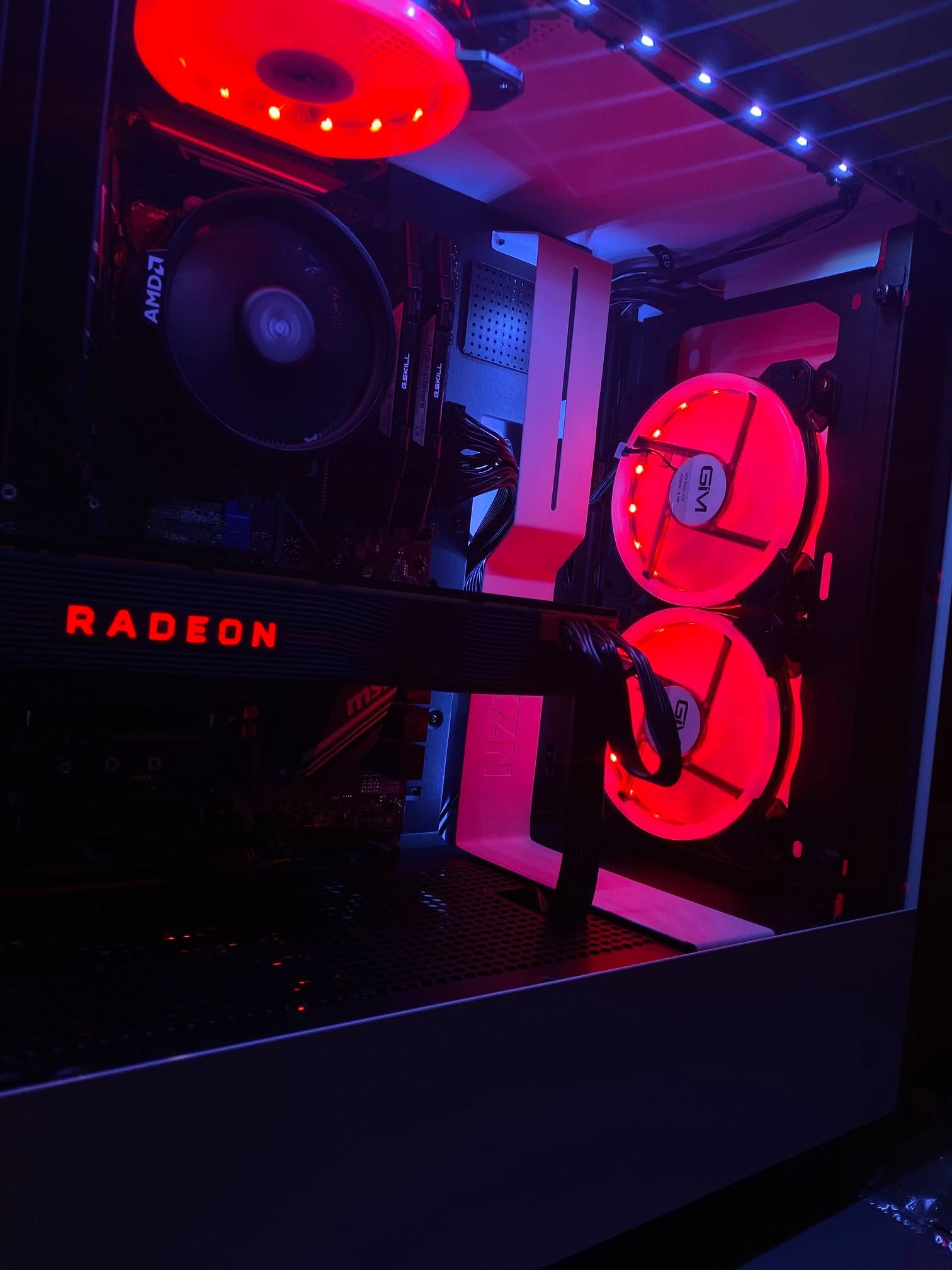 Custom PC build with Radeon hardware and red lighting